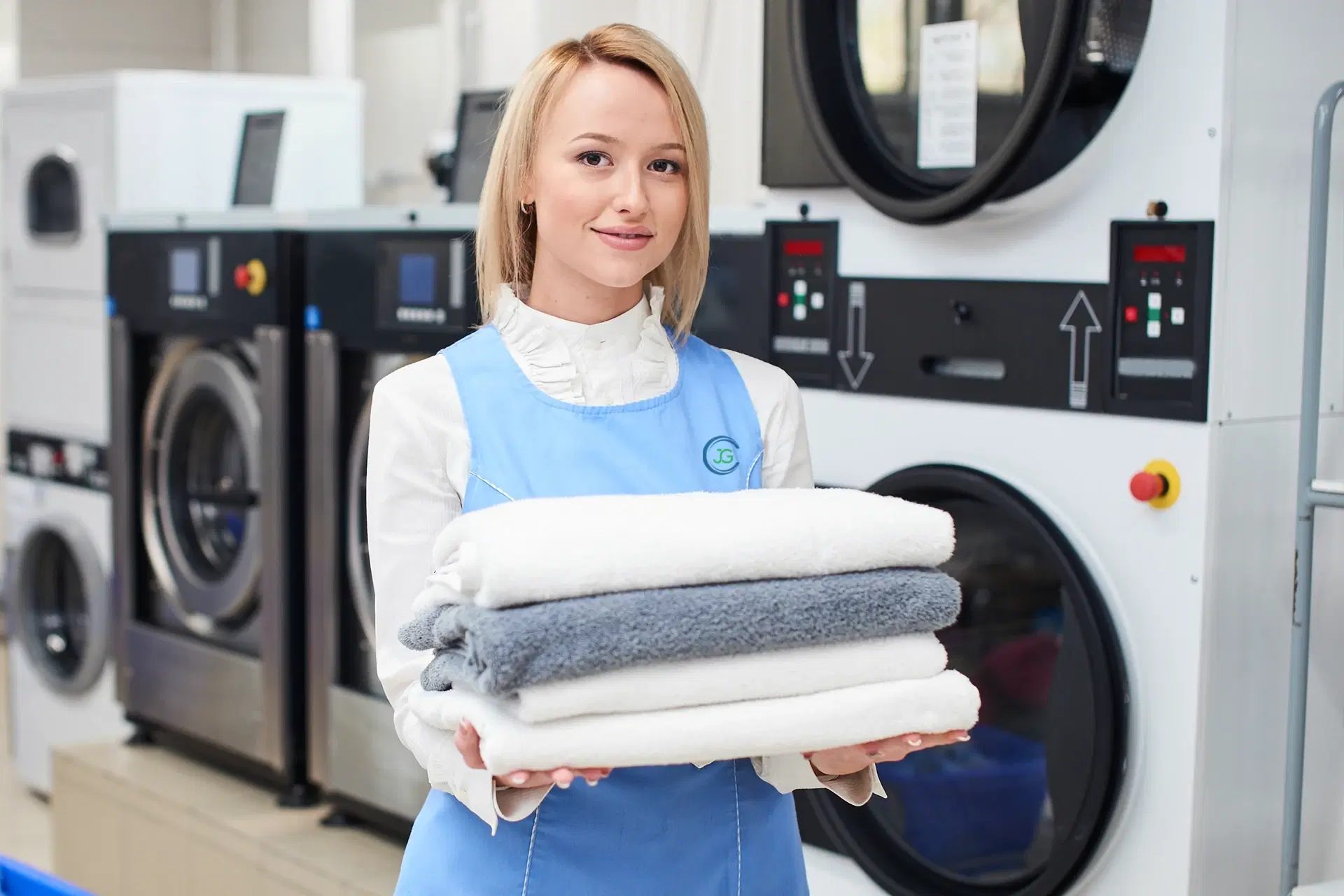 Photo: neatly folded towels stack with soft natural light